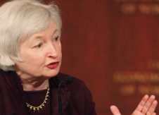 Divided Fed holds fire, signals 2016 rate increase still likely