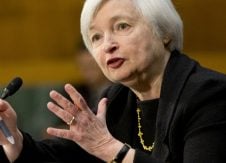 Fed raises key interest rate for first time in almost a decade