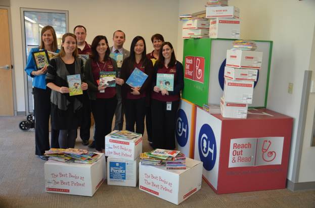 Pictured from left to right: Kirsten Rogers, Coordinator of the Children’s Hospital of Philadelphia’s “Reach Out and Read” Program, Lisa Rabbit, Children's Miracle Network and Retail Cause Marketing Coordinator at The Children's Hospital of Philadelphia, and American Heritage Federal Credit Union employees.
