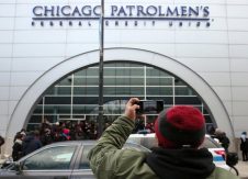 Protesters block access to police credit union