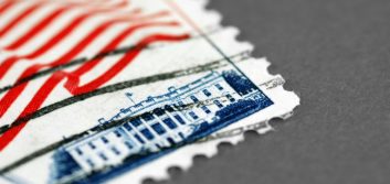 USPS makes history, cutting stamp prices 2¢. But does it matter?