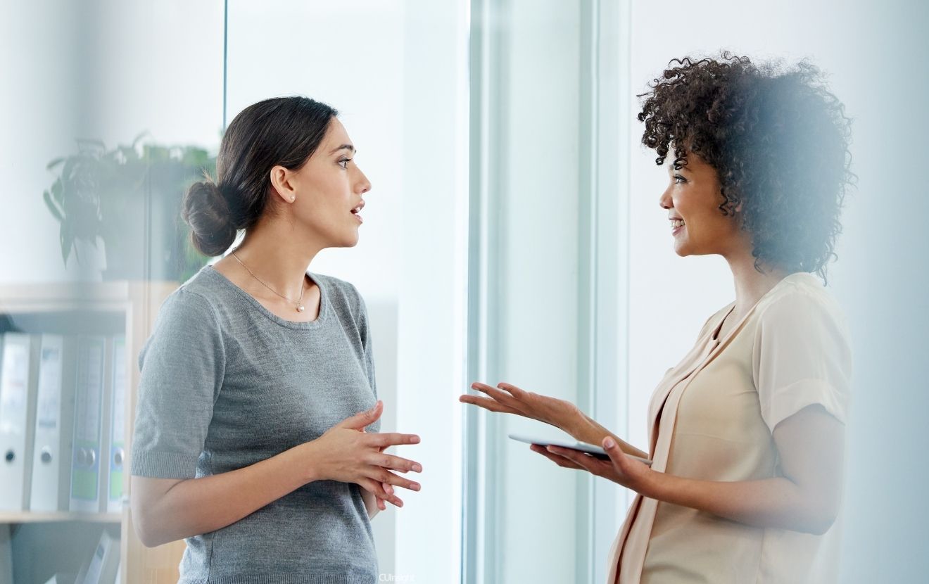 2 women talking