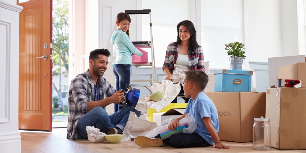 Hispanic Family Moving Into New Home