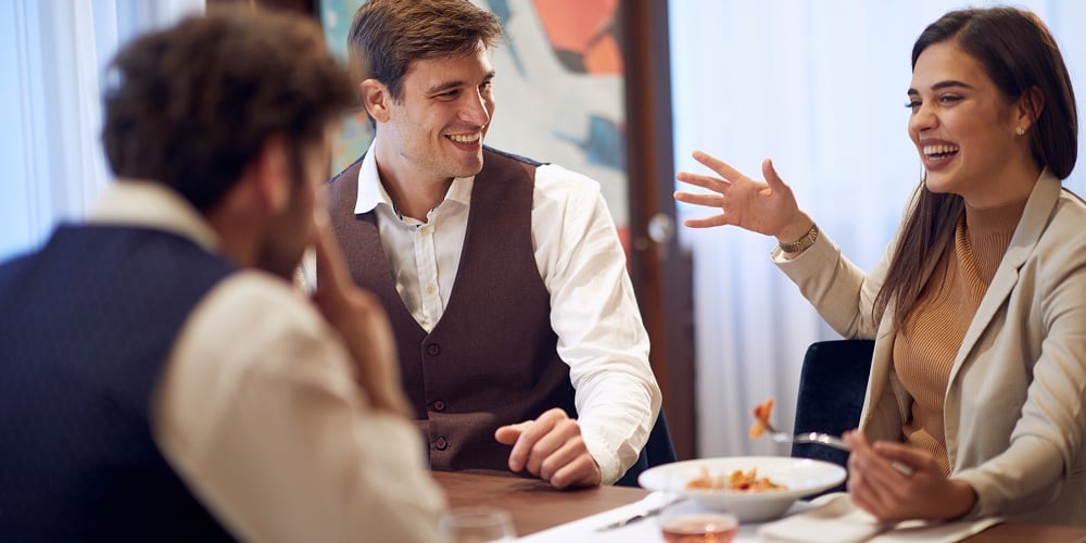 A group of business partners having a good time at a lunch in a relaxed atmosphere at the restaurant