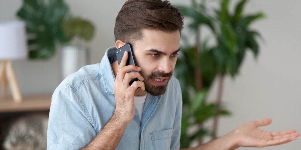 bigstock-Angry-Man-Talking-On-Smartphon-270465619-e1589316586971