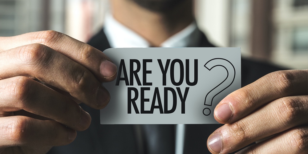 Are You Ready?|Woman Holding Card With Text Are You Ready? Isolated On White
