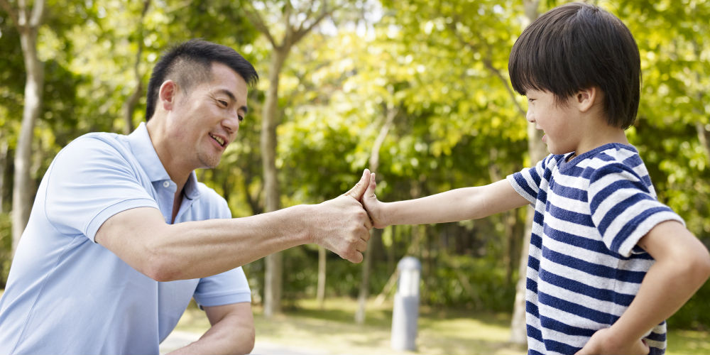 bigstock-Asian-Father-And-Son-Making-A–91514156