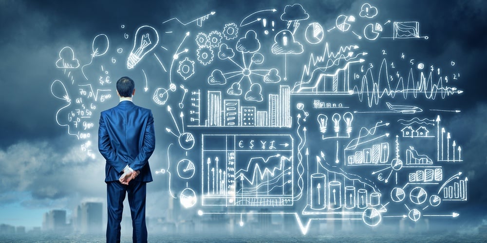 Back view image of young businessman standing against business sketch