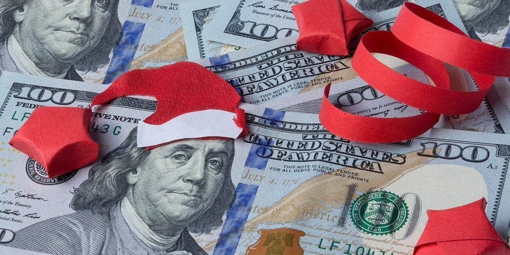 bigstock-bank-note-with-santa-christma-107208158-e1448457914921