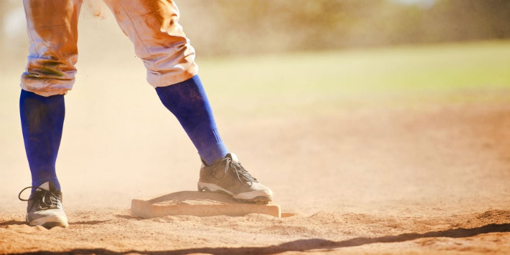 1|2|bigstock-Baseball-Player-On-The-Base-75646459
