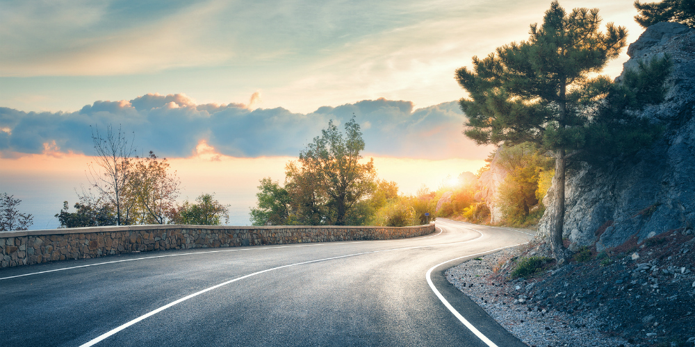 bigstock-Beautiful-Asphalt-Road-In-The-188384728