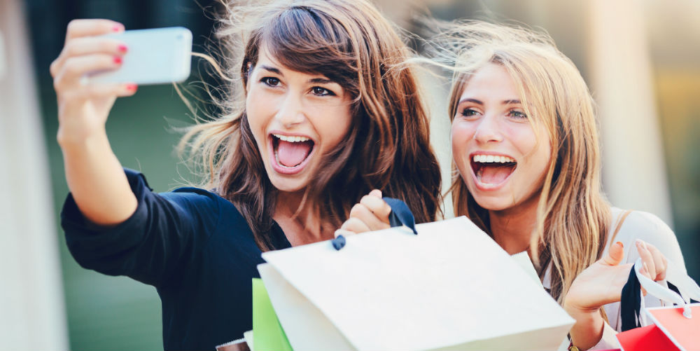 bigstock-Beautiful-girls-with-shopping-62192555