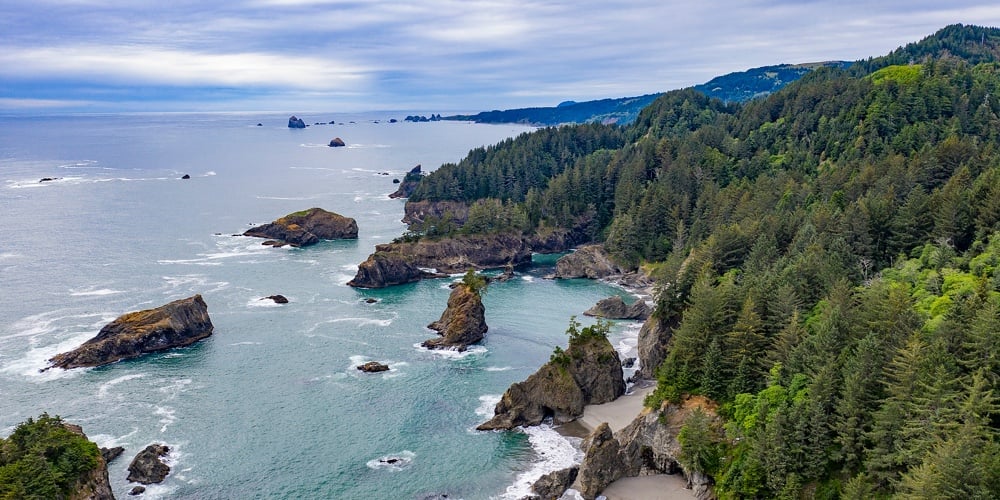 bigstock-Beautiful-seascape-with-rocks-387465256
