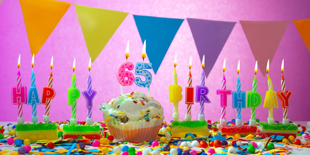 Birthday Card With Number 65 Year. Happy Birthday To Six Ten Five Year Old. Candles Burn With A Fest
