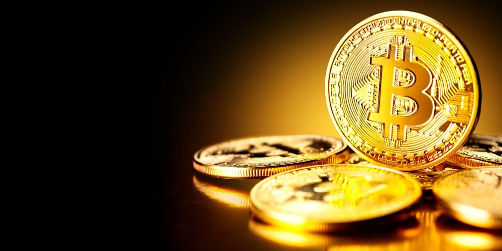bigstock-Bitcoin-Crypto-currency-Gold-217808998