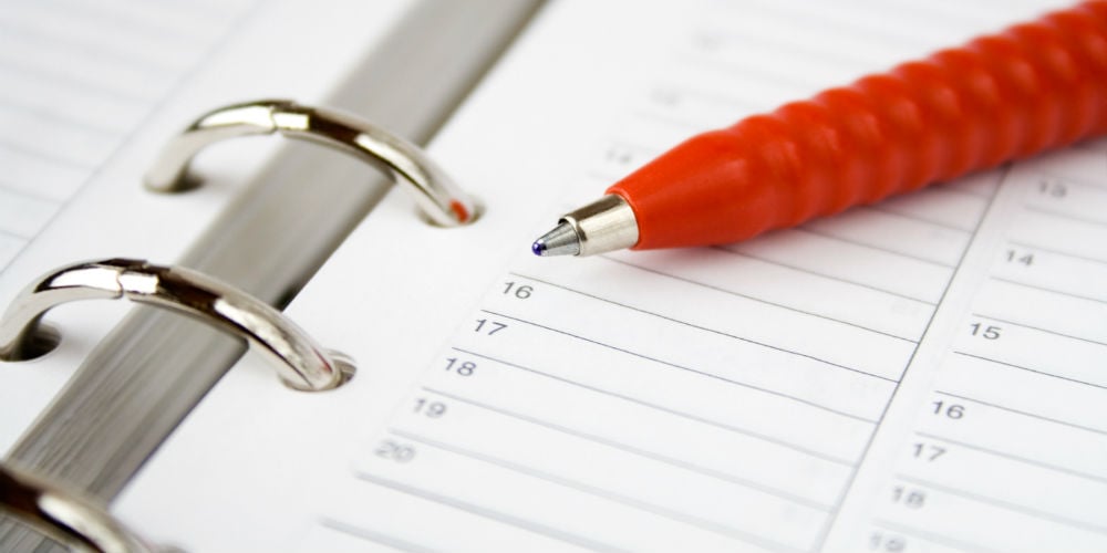 bigstock-Blank-Calendar-And-Red-Pen-1099877