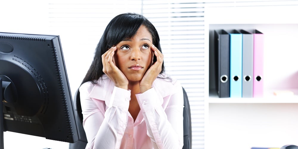 Bored Black Businesswoman In Office