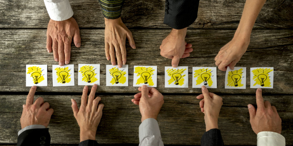 bigstock-Brainstorming-And-Teamwork-Con-99688769