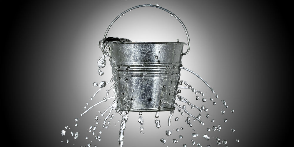 bigstock-Bucket-With-Holes-80634491