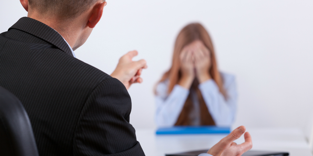 bigstock-Bullying-On-The-Job-Meeting-74720983
