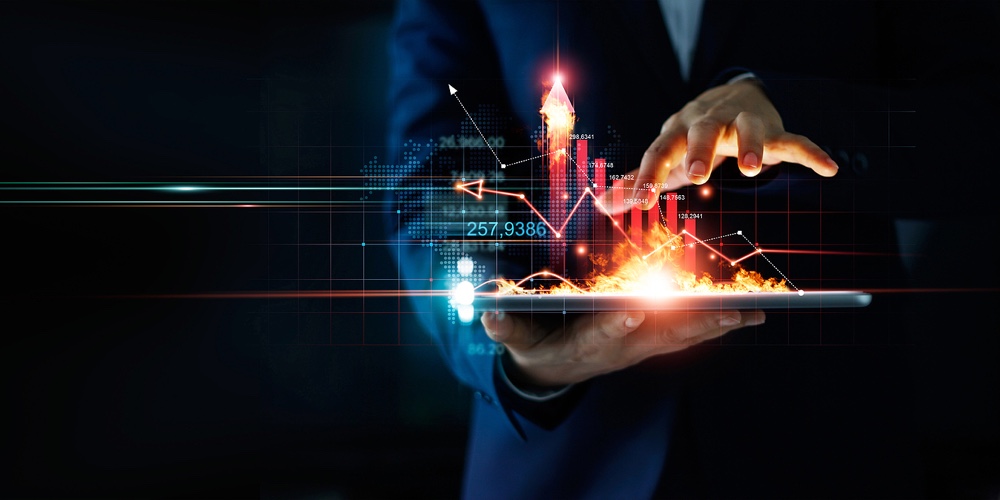 Business Growth. Businessman Holding Tablet And A Hot Of Fire Glowing Upright Arrow With Analyzing D