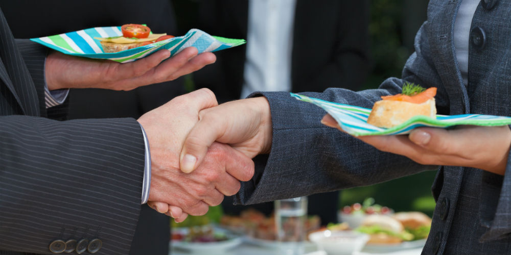 bigstock-Business-Handshake-During-Lunc-54040006