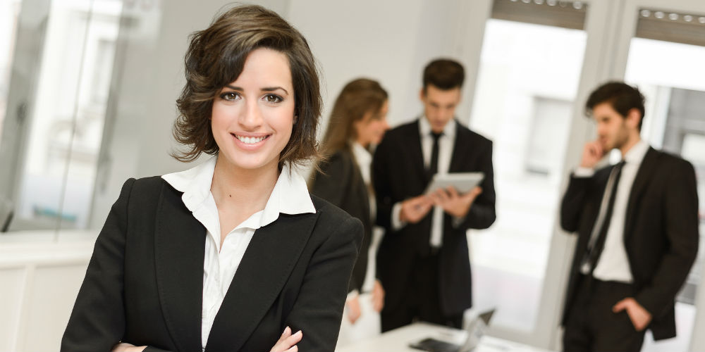 bigstock-Business-Leader-Looking-At-Cam-63250303