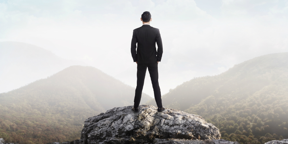 bigstock-Business-Man-Standing-On-The-T-91498259