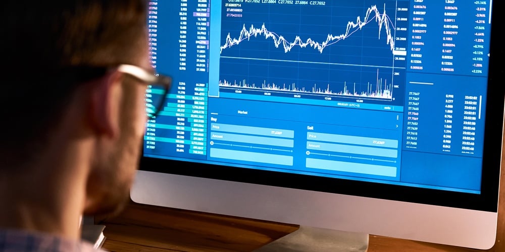 bigstock-Business-Man-Trader-Broker-Loo-395102441