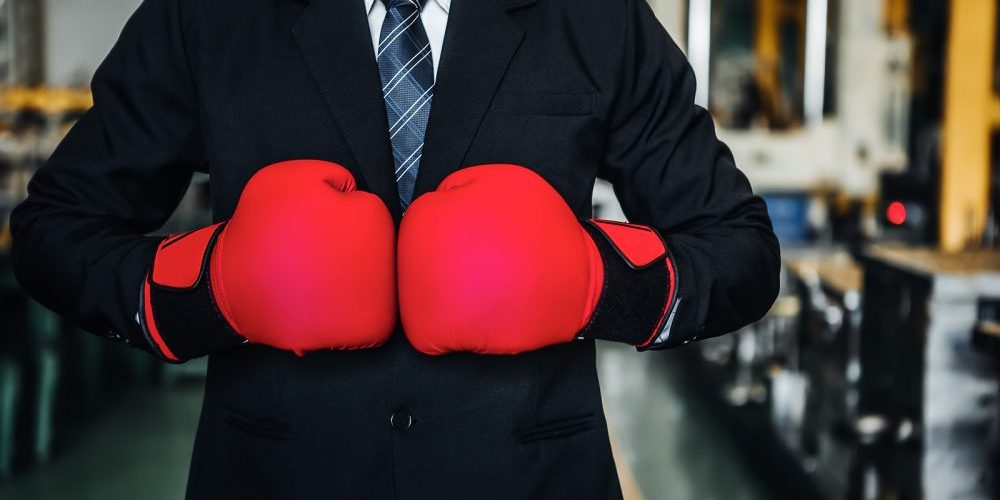 bigstock-Business-Man-Wearing-Red-Boxin-326975701-e1597165357640