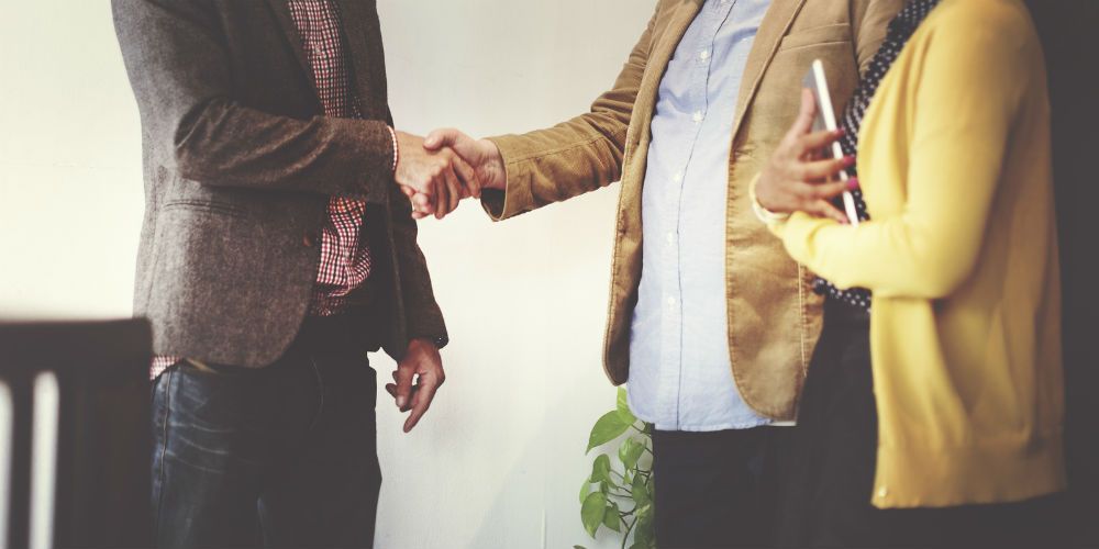bigstock-Business-Team-Partnership-Gree-106459367