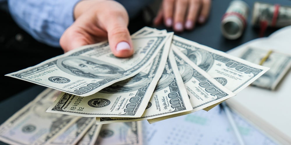 Unrecongnizable Businessman With Money In Suit Business Man Putting Money In Pocket Suit Rich Guy Ea|Bundles Of Money With Dollars. Banknotes American Dollar. Illegal Payment Of Wages And Corruption. C|Business Woman Displaying A Spread Of Cash Us Dollars. Close-up. Income And Business Concept. Venali|Business Woman Displaying A Spread Of Cash Us Dollars. Close-up. Income And Business Concept. Venali