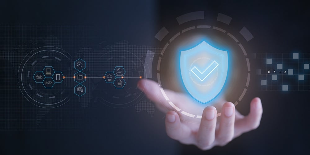 image1 copy|Business Woman Holding Shield Protect Icon On Virtual Screen. Cybersecurity Network Of Connected Dev