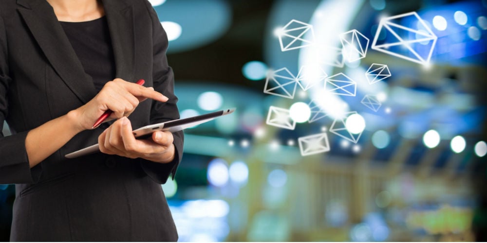 bigstock-Business-Woman-Sending-Email-B-102285938