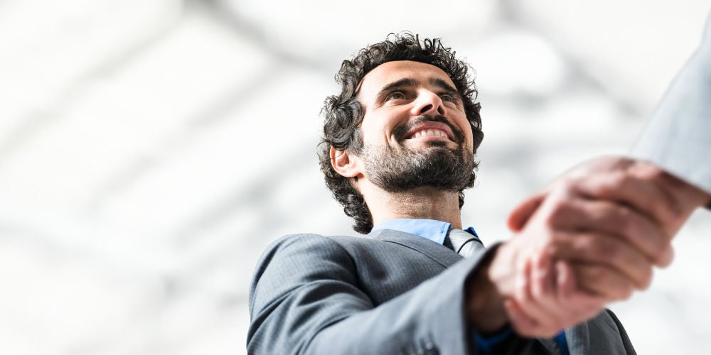 bigstock-Business-handshake-Businessma-830362671