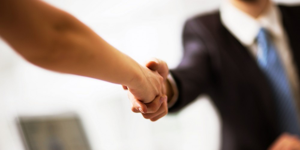 bigstock-Business-people-shaking-hands-82830557-e1455653074111