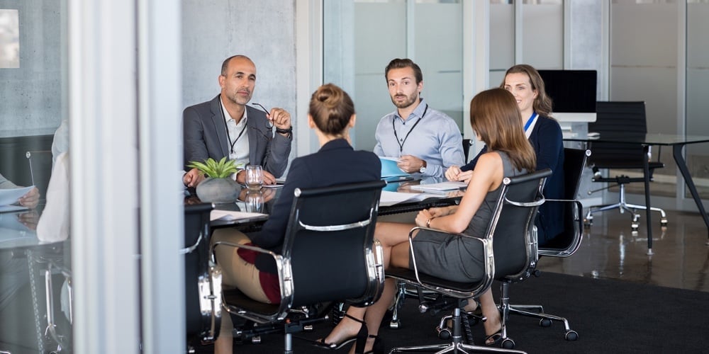 bigstock-Business-people-sitting-in-boa-206016238