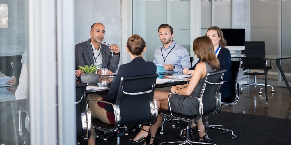 bigstock-Business-people-sitting-in-boa-206016238