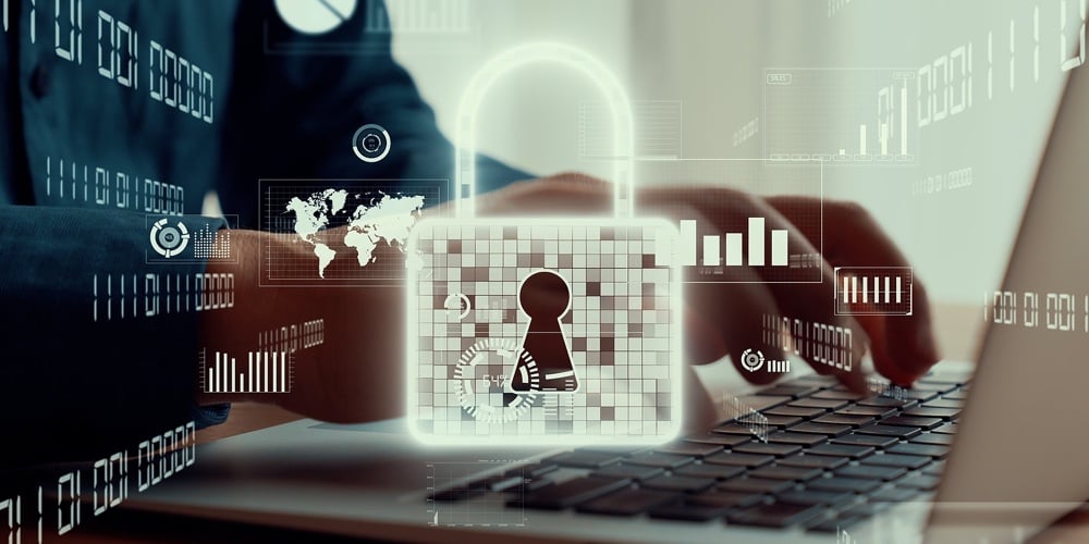 Businessman Uses Capable Laptop Computer To Manage Cyber Security System For Defending Computer Viru