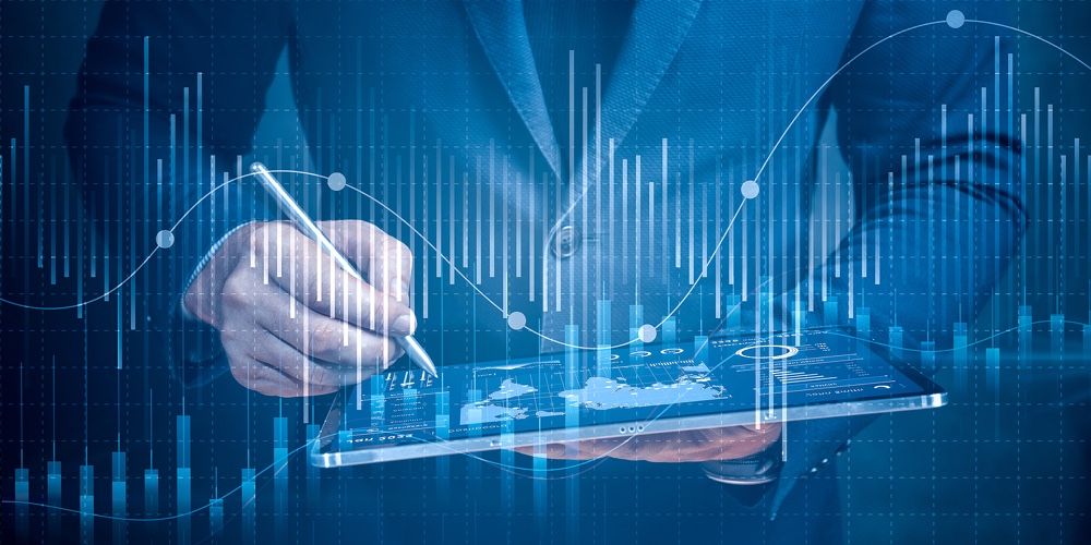 Businessman Using Tablet Analyzing Sales Data And Economic Growth Graph Chart. Digital Online Market