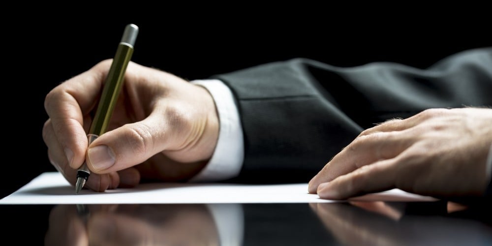 bigstock-Businessman-Writing-A-Letter-O-57436670-e1447934592343