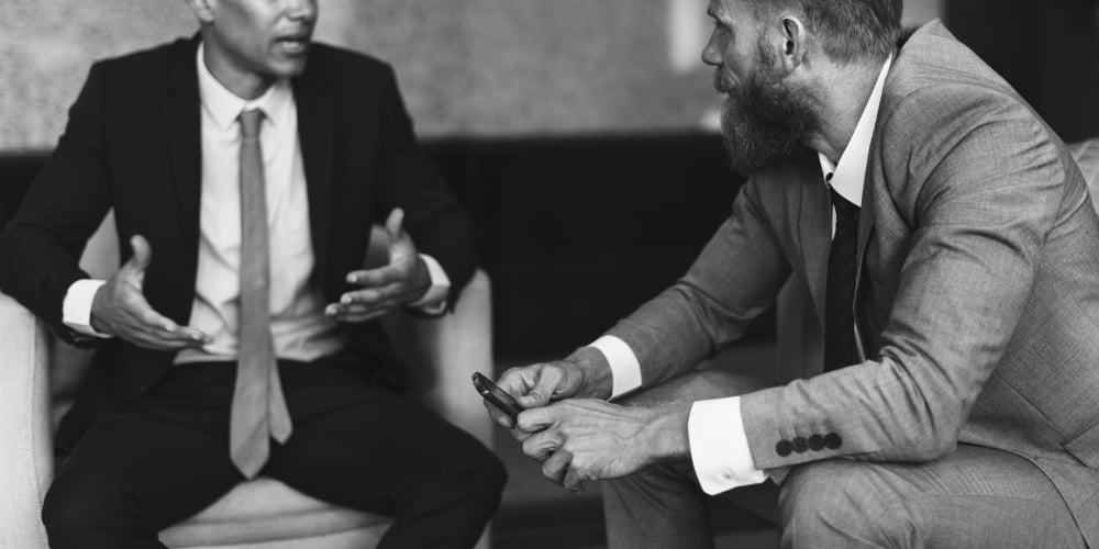 bigstock-Businessmen-Talking-Brainstorm-169041827-1