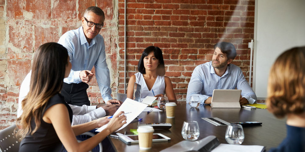 bigstock-Businesspeople-Meeting-In-Mode-169495187