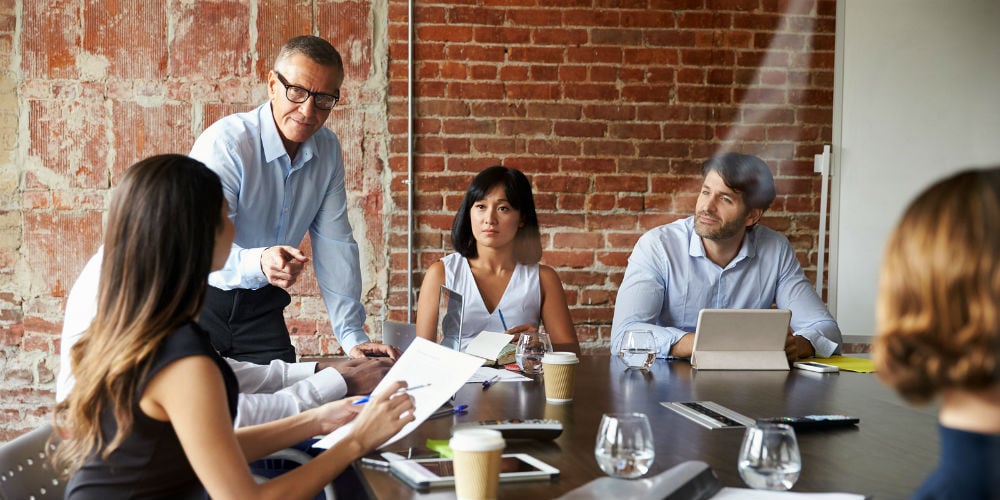 bigstock-Businesspeople-Meeting-In-Mode-169495187