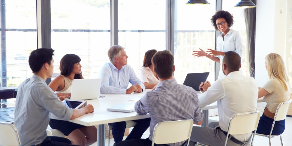 bigstock-Businesswoman-presenting-to-co-90004202