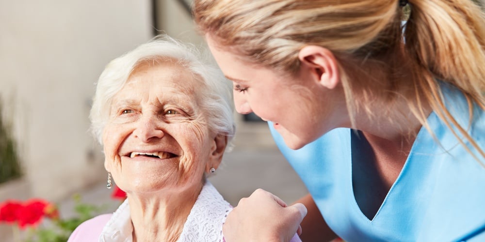 bigstock-Caring-Nurse-Caring-for-Senior-276599107