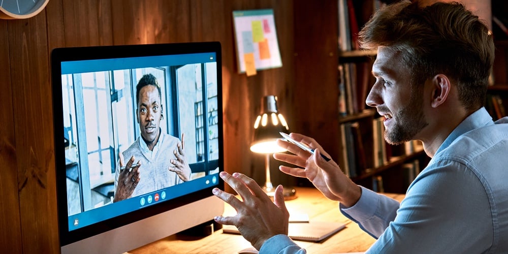 Caucasian Business Man Talking With African Male Partner Coach On Video Conference Call Discussing S
