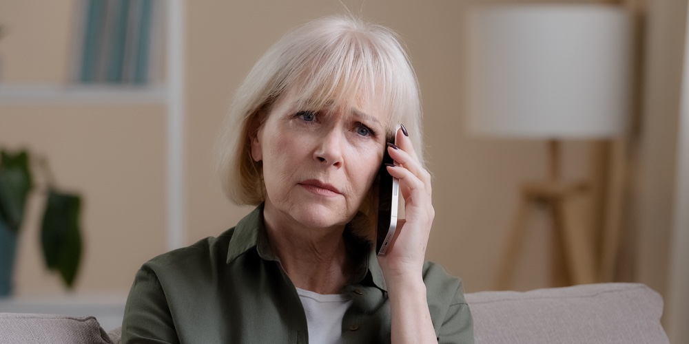 Caucasian Old Woman Mature Middle-aged 50s Offended Lady Aged Businesswoman Sitting On Sofa At Home
