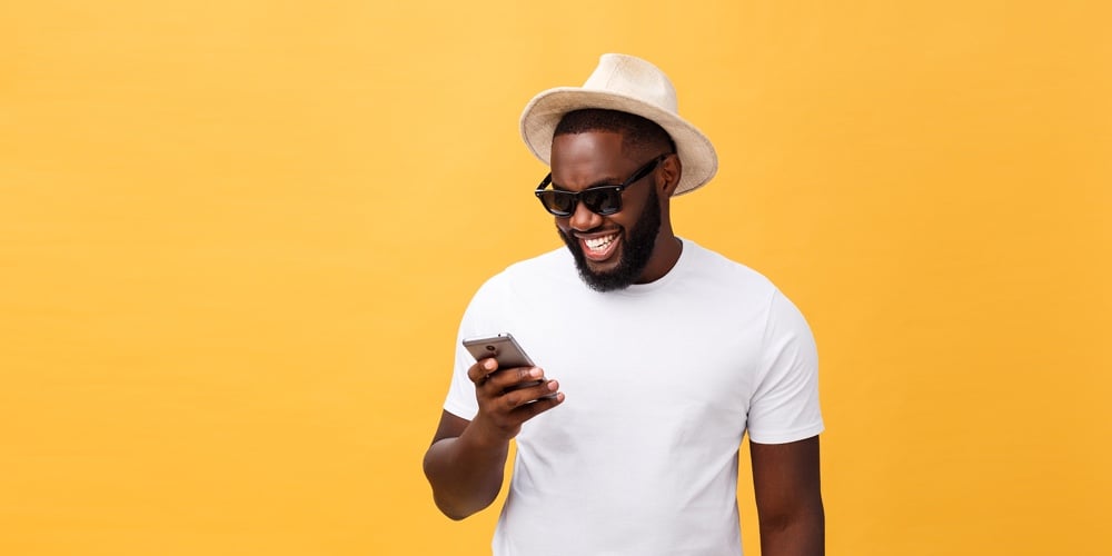 bigstock-Cheerful-African-American-Man-266421484