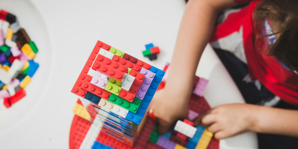 bigstock-Child-Plays-With-Lego-Bricks-I-65146492